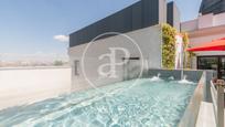 Swimming pool of Flat for sale in  Madrid Capital  with Air Conditioner, Heating and Terrace