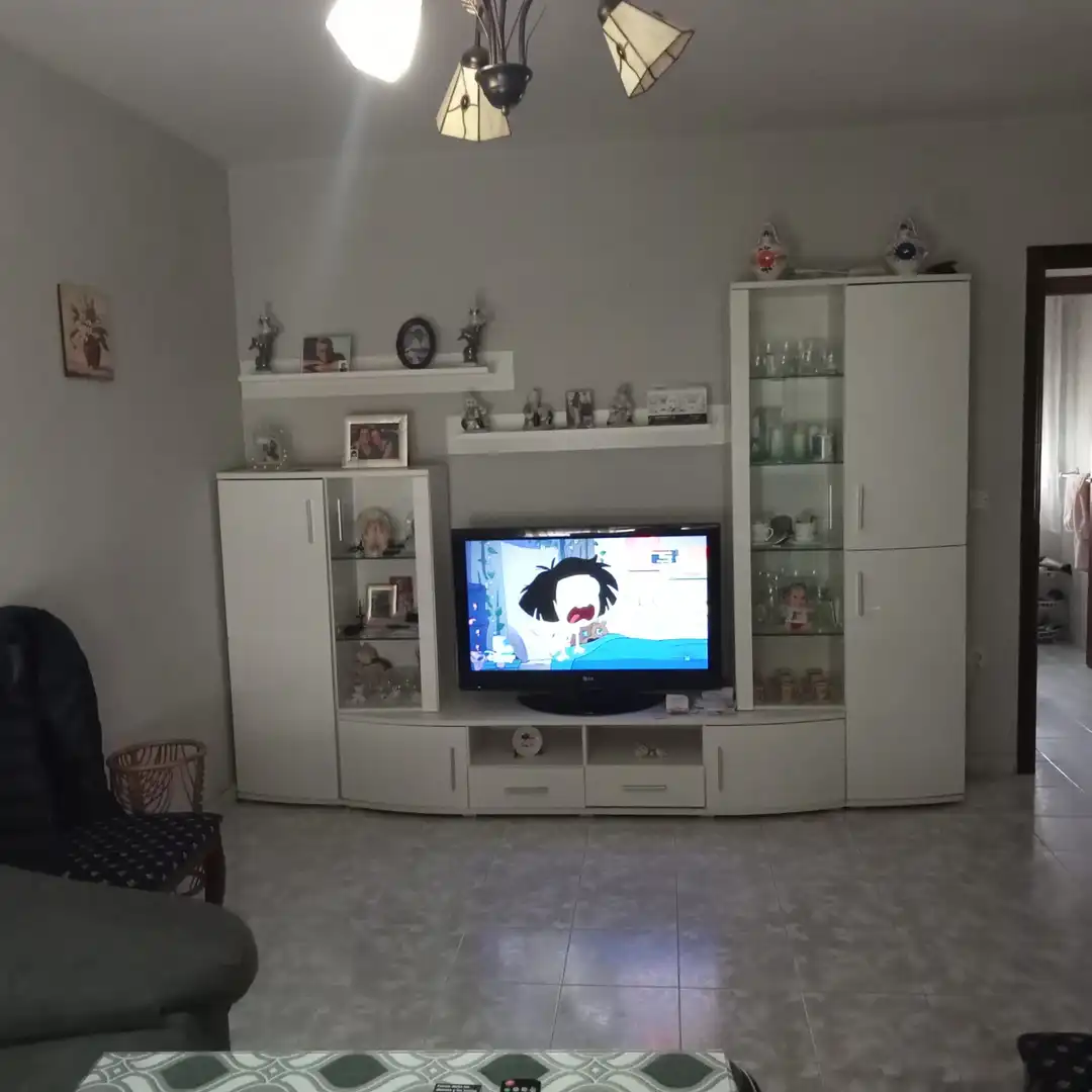 Wohnzimmer von Einfamilien-Reihenhaus zum Verkauf in Huélaga mit Klimaanlage, Privatgarten und Terrasse