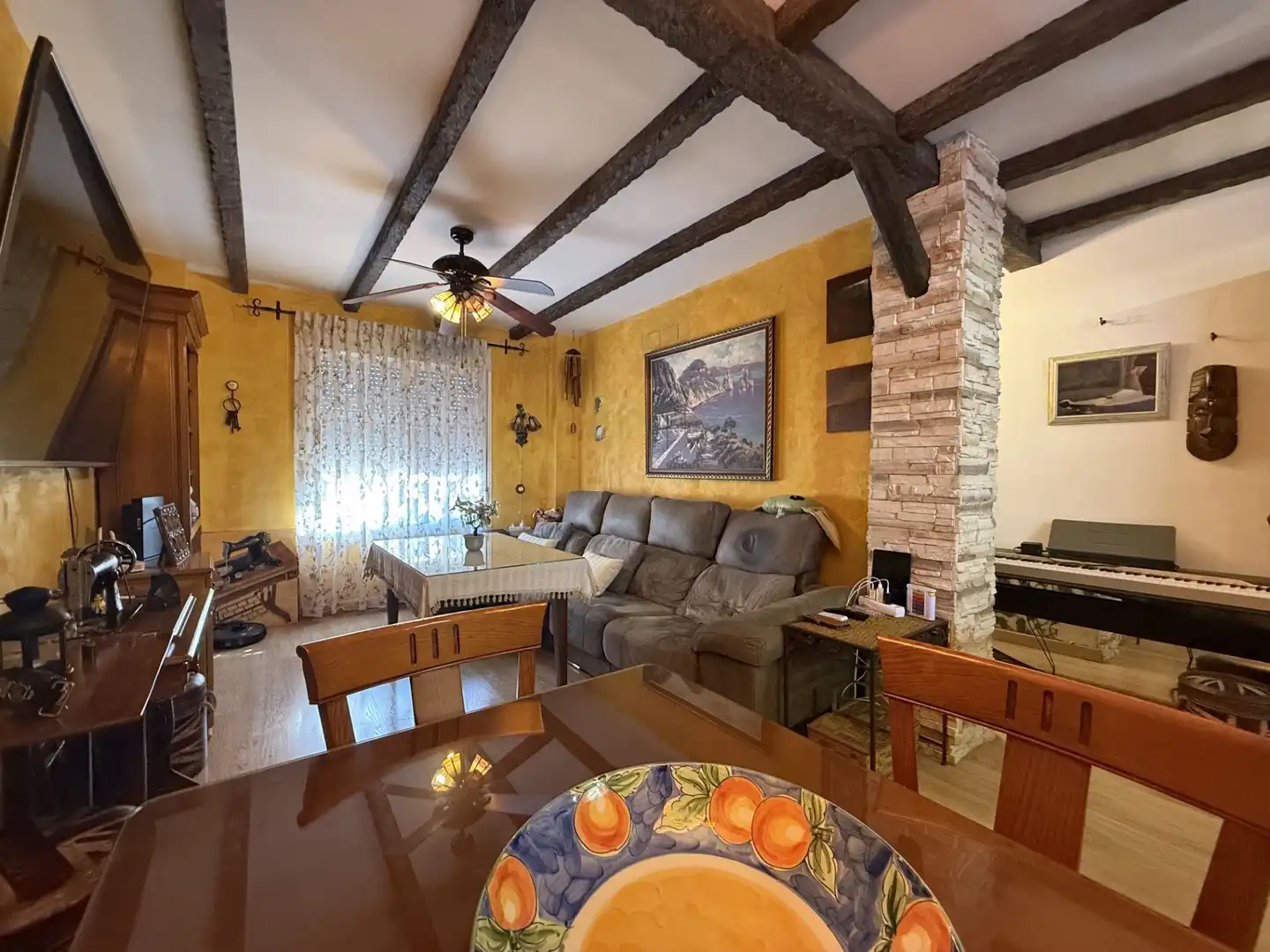 Sala de estar de Casa adosada en venta en Aljaraque con Aire acondicionado, Terraza y Piscina comunitaria