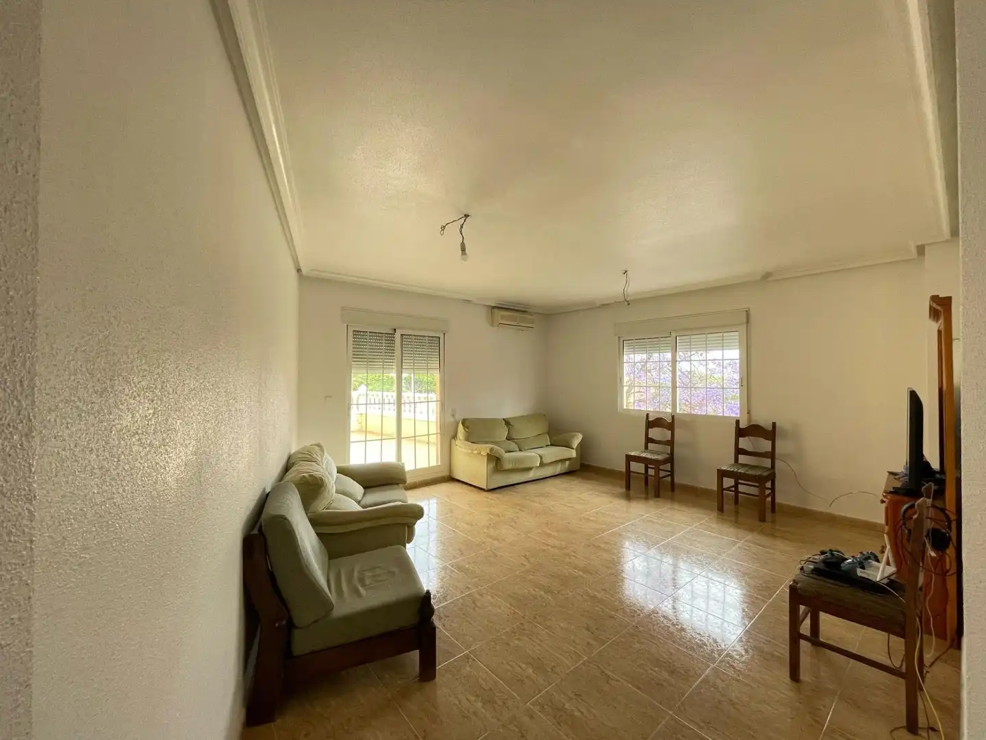 Sala d'estar de Casa o xalet en venda en Torre-Pacheco amb Aire condicionat, Jardí privat i Terrassa