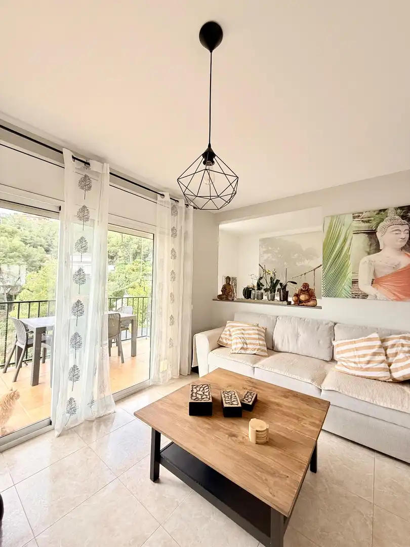 Sala de estar de Casa adosada en venta en Calafell con Calefacción, Jardín privado y Terraza
