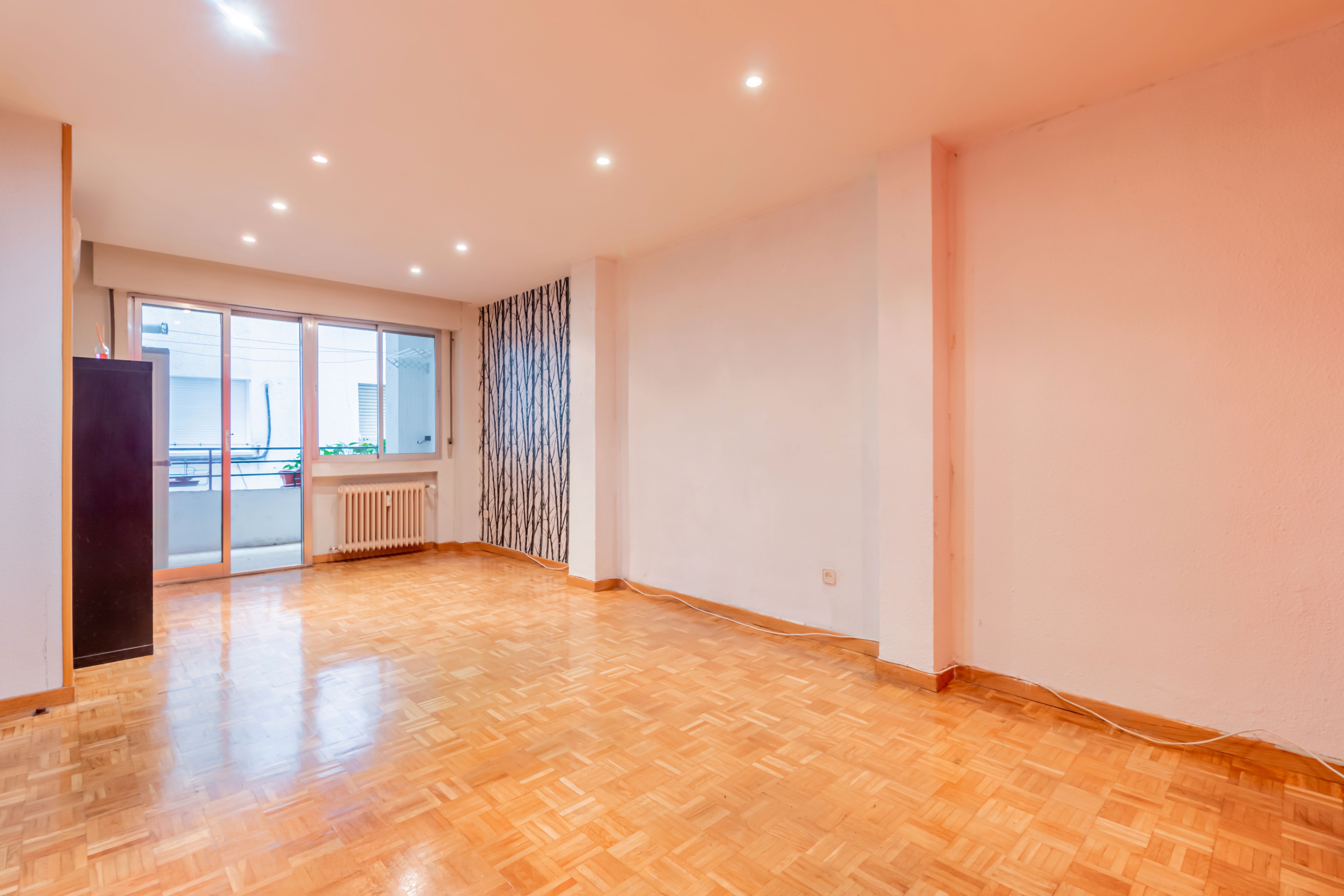 Sala d'estar de Pis en venda en  Madrid Capital amb Calefacció i Terrassa