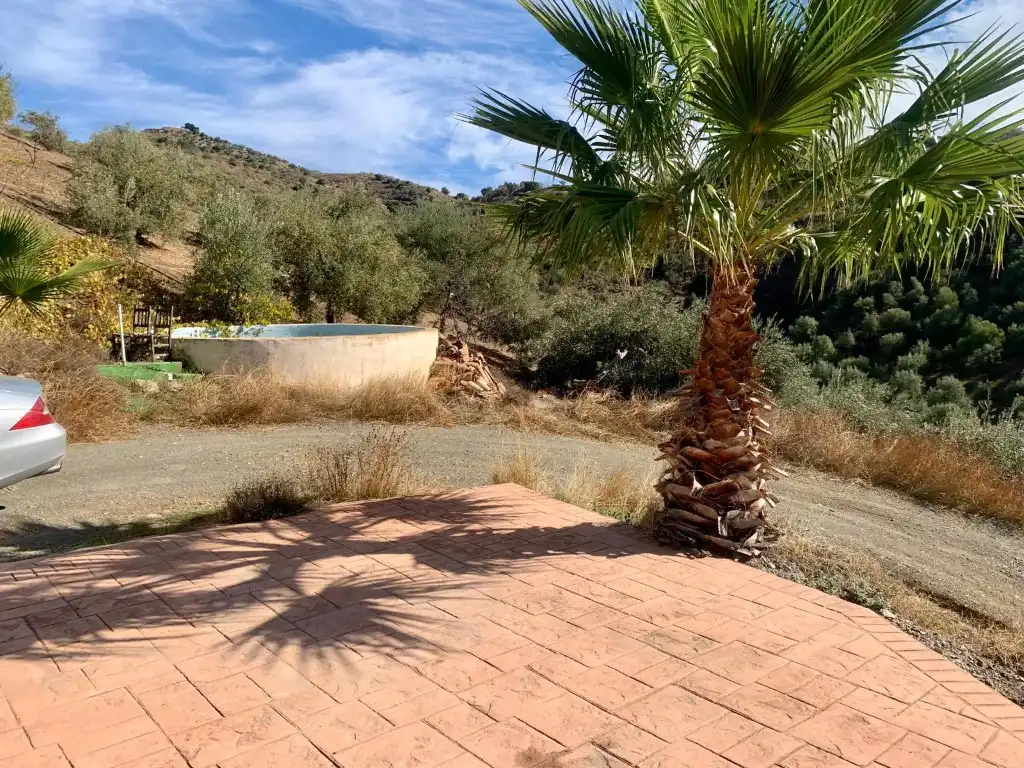 Vista exterior de Casa o xalet en venda en Viñuela amb Aire condicionat, Jardí privat i Terrassa