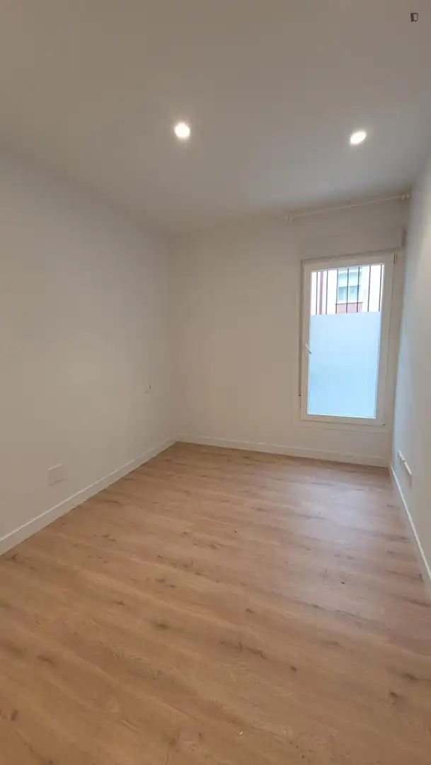 Dormitori de Apartament de lloguer en Madrid amb Aire condicionat, Moblat i Forn