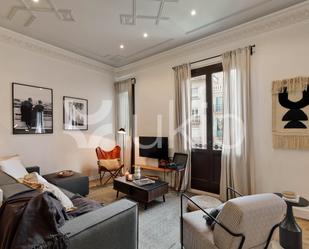 Sala d'estar de Apartament de lloguer en  Barcelona Capital amb Aire condicionat, Terrassa i Moblat