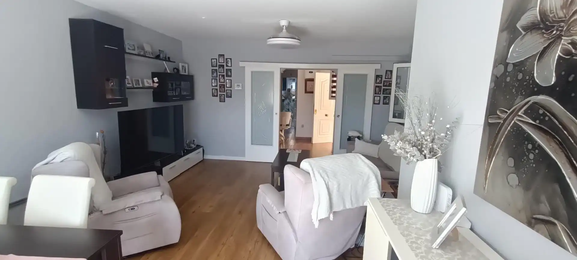 Sala de estar de Casa adosada en venta en La Nucia con Aire acondicionado, Calefacción y Jardín privado