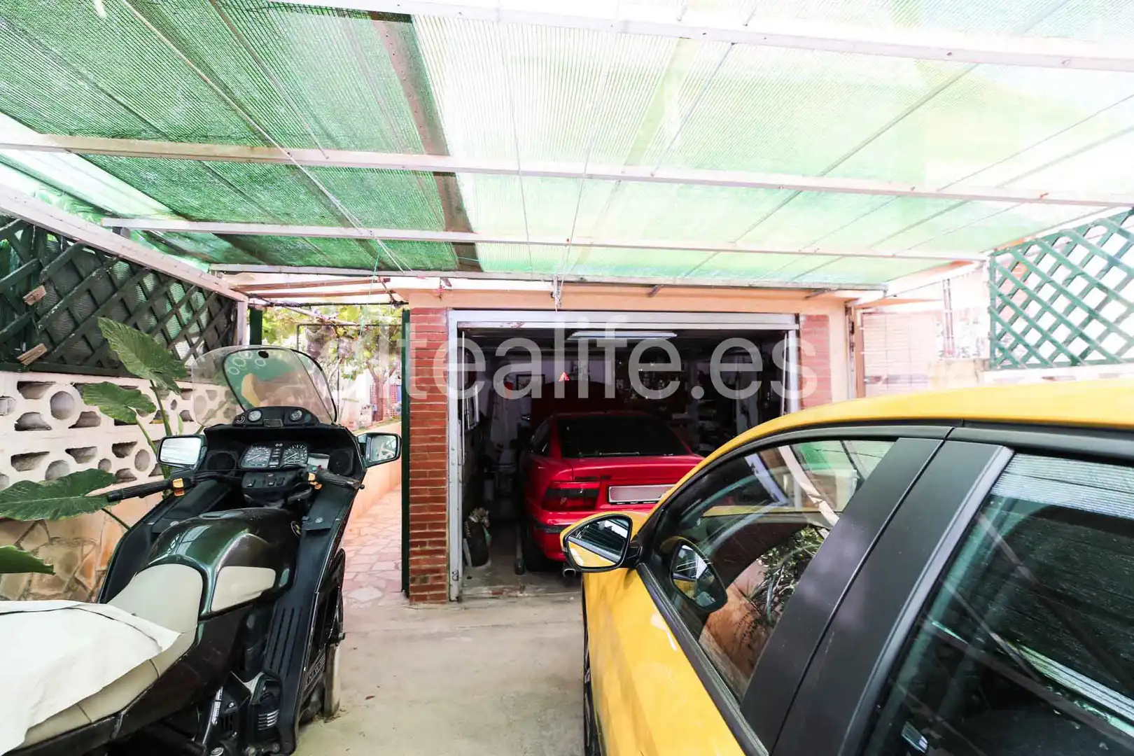 Aparcament de Casa o xalet en venda en La Nucia amb Aire condicionat, Jardí privat i Terrassa