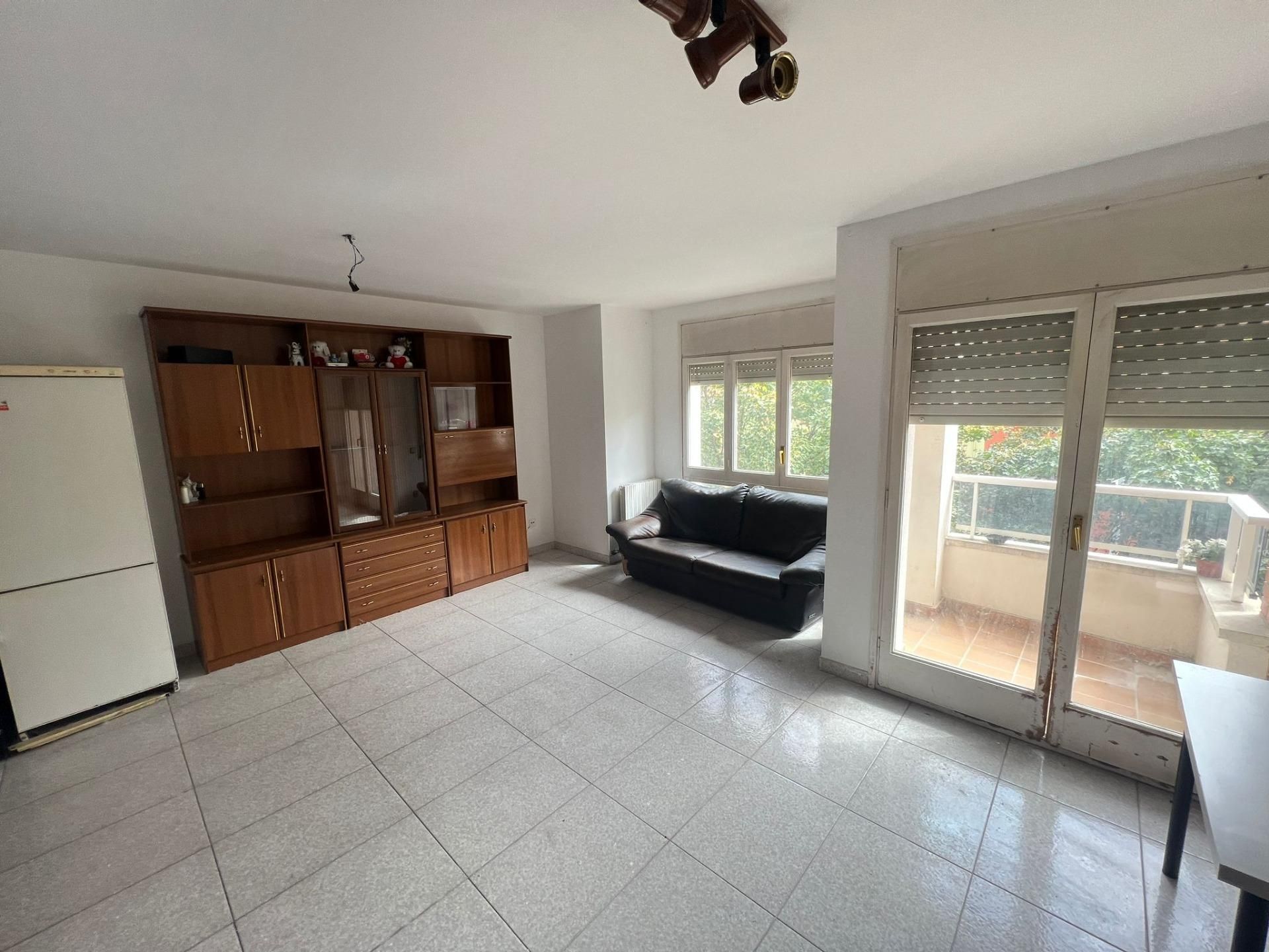 Sala d'estar de Casa adosada en venda en Vic