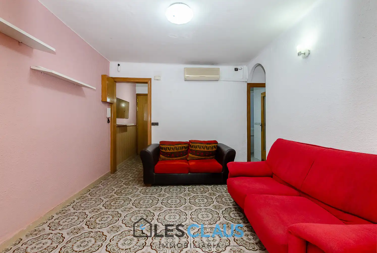 Sala d'estar de Pis en venda en Esplugues de Llobregat amb Aire condicionat i Moblat
