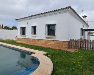 Exterior view of House or chalet for sale in Chiclana de la Frontera  with Air Conditioner, Private garden and Swimming Pool