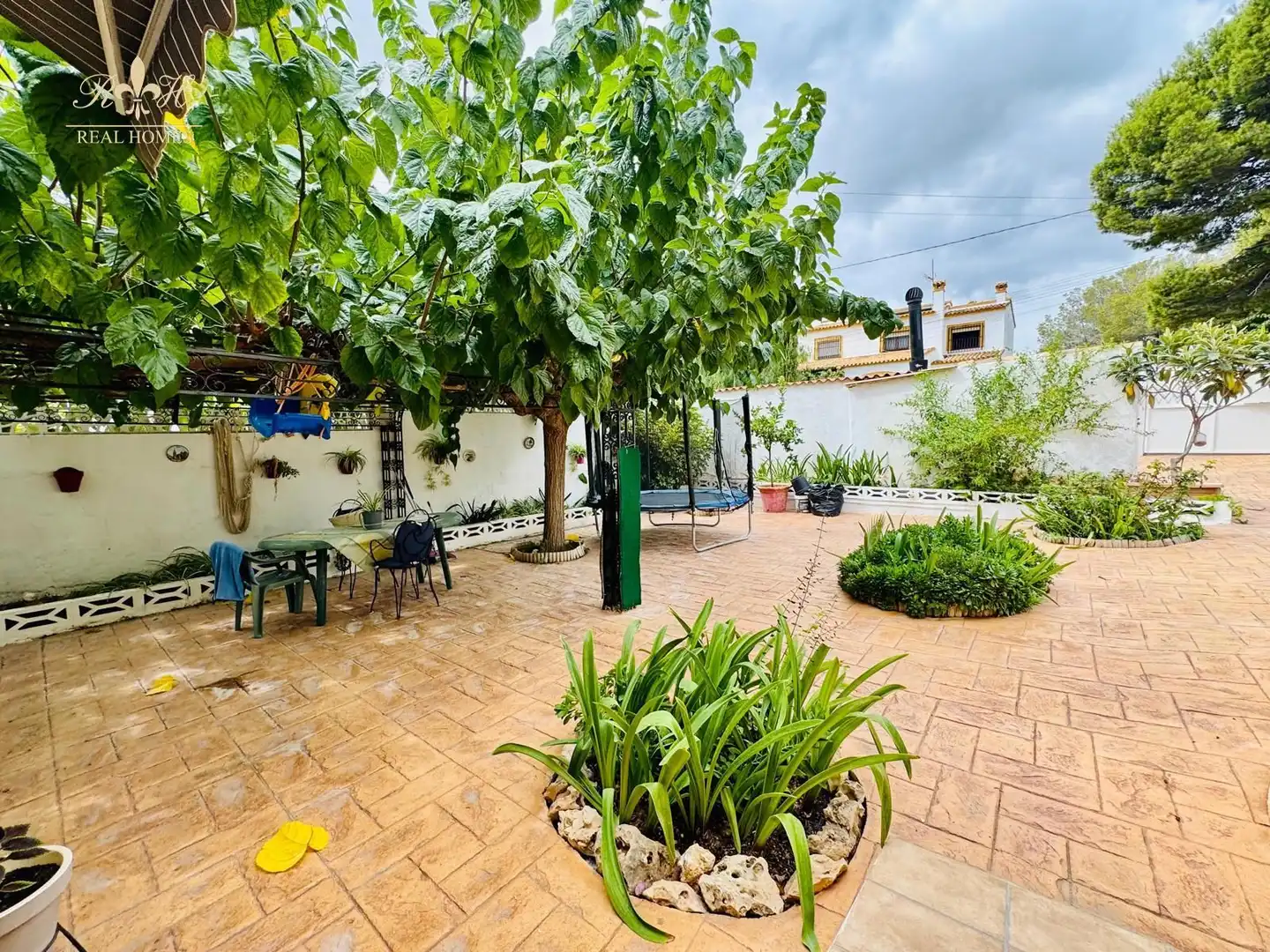 Garten von Einfamilien-Reihenhaus zum Verkauf in L'Alfàs del Pi mit Klimaanlage, Terrasse und Schwimmbad