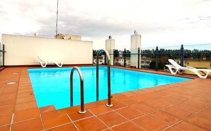 Swimming pool of Apartment for sale in Gelves  with Air Conditioner, Heating and Parquet flooring