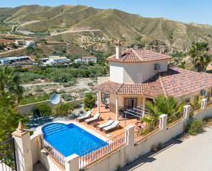 Vista exterior de Casa o xalet en venda en Arboleas amb Aire condicionat, Jardí privat i Piscina