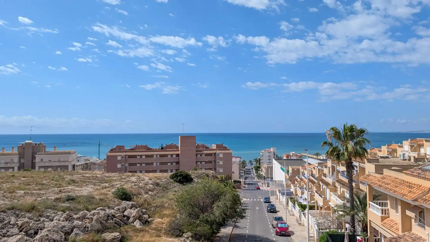 Vista exterior de Casa adosada en venta en Santa Pola con Aire acondicionado, Terraza y Piscina
