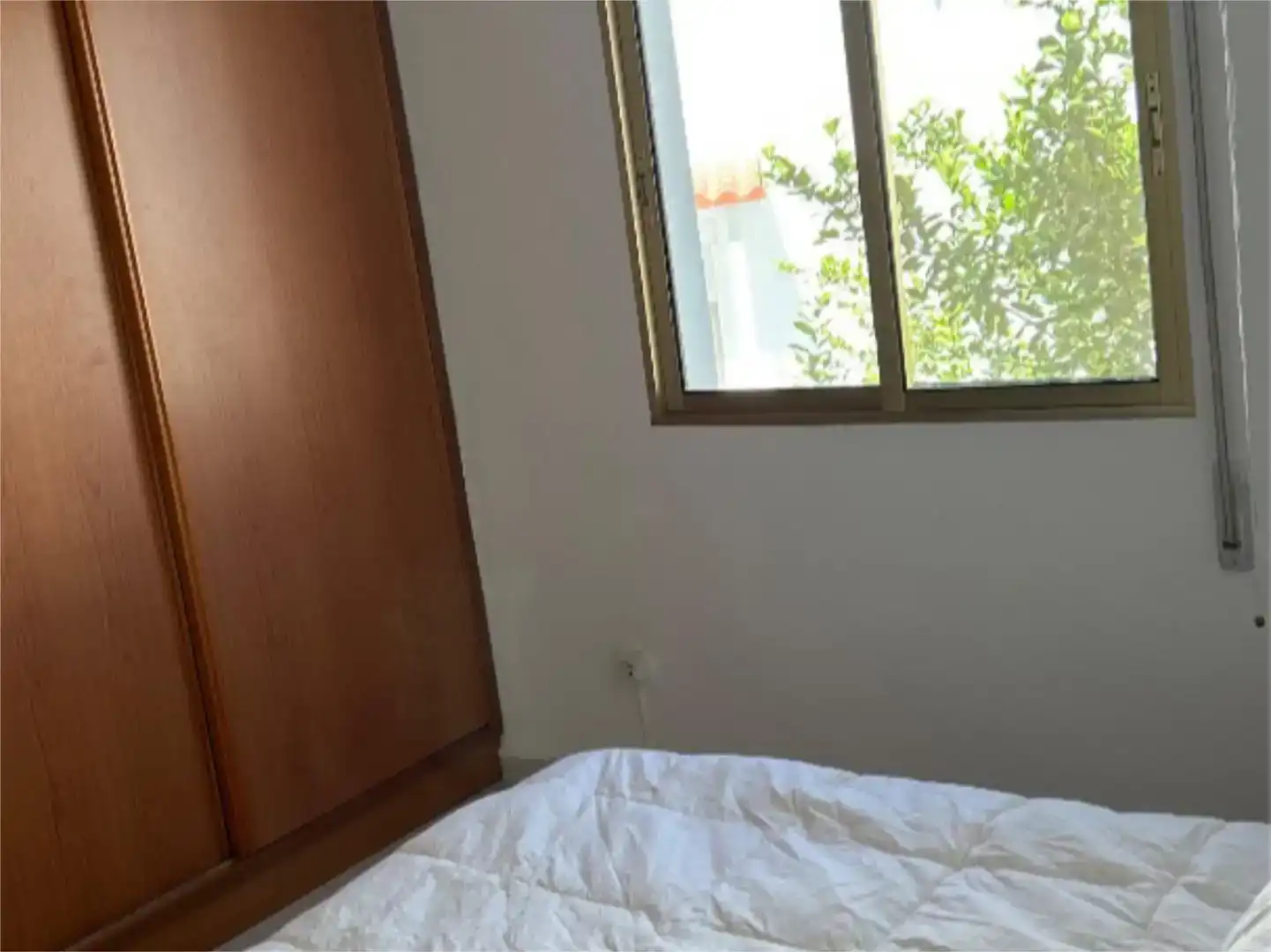Dormitori de Casa adosada per a compartir en Mérida amb Aire condicionat i Moblat