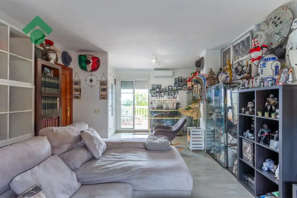Sala d'estar de Casa adosada en venda en Vélez-Málaga amb Aire condicionat, Terrassa i Piscina comunitària