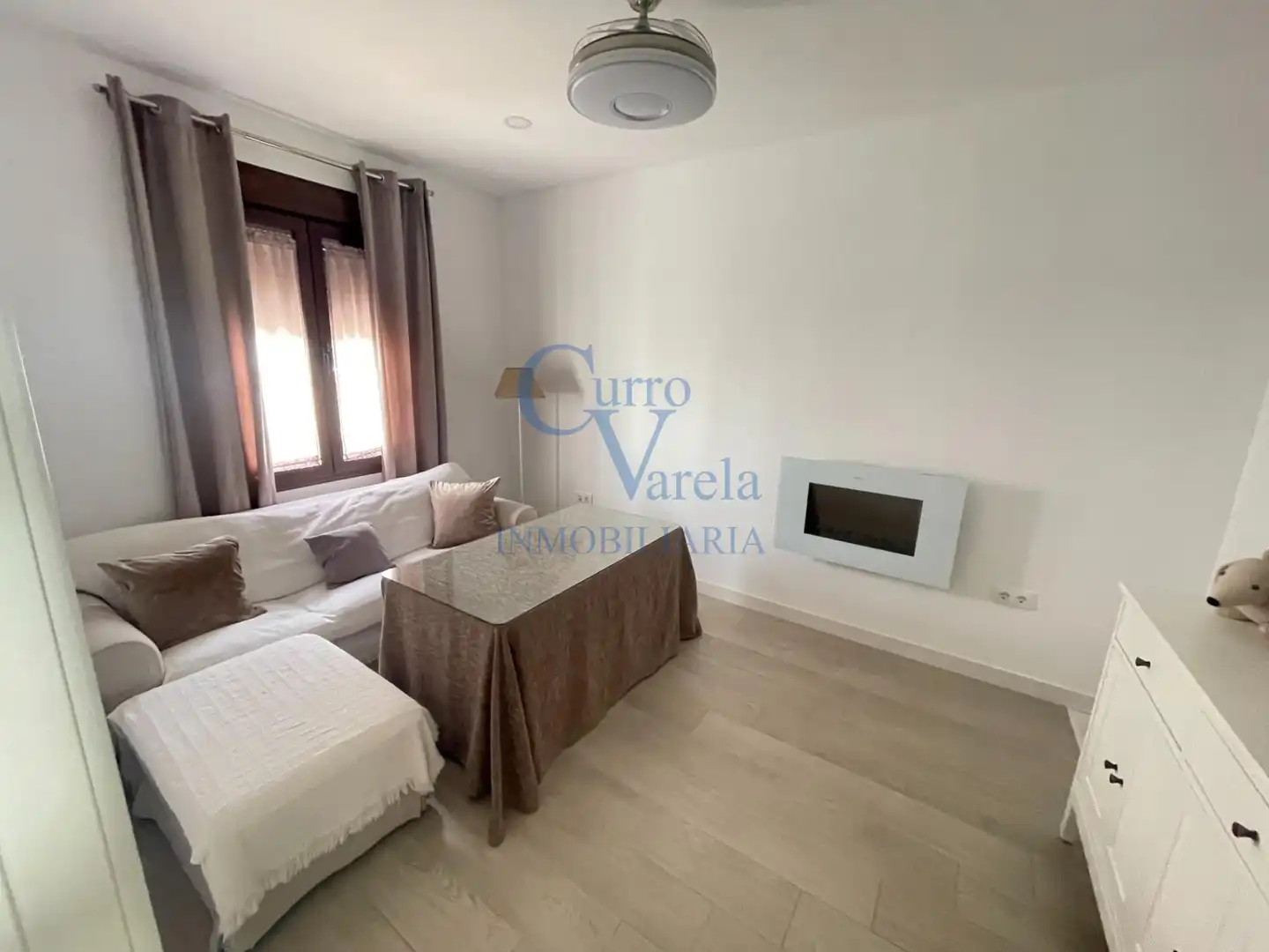 Sala de estar de Casa adosada en venta en Dos Hermanas