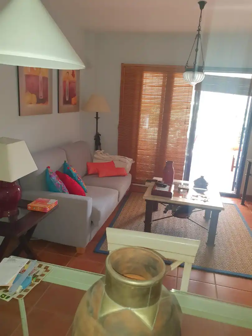 Sala de estar de Casa adosada en venta en Islantilla con Terraza, Amueblado y Lavadora