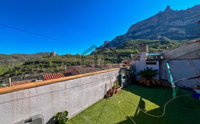 Exterior view of Single-family semi-detached for sale in Monistrol de Montserrat  with Terrace and Balcony