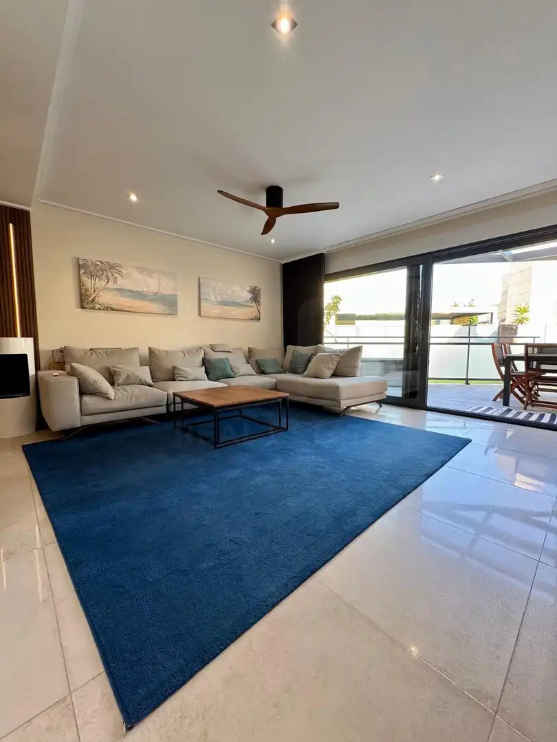 Sala de estar de Casa adosada en venta en El Campello con Aire acondicionado, Calefacción y Terraza