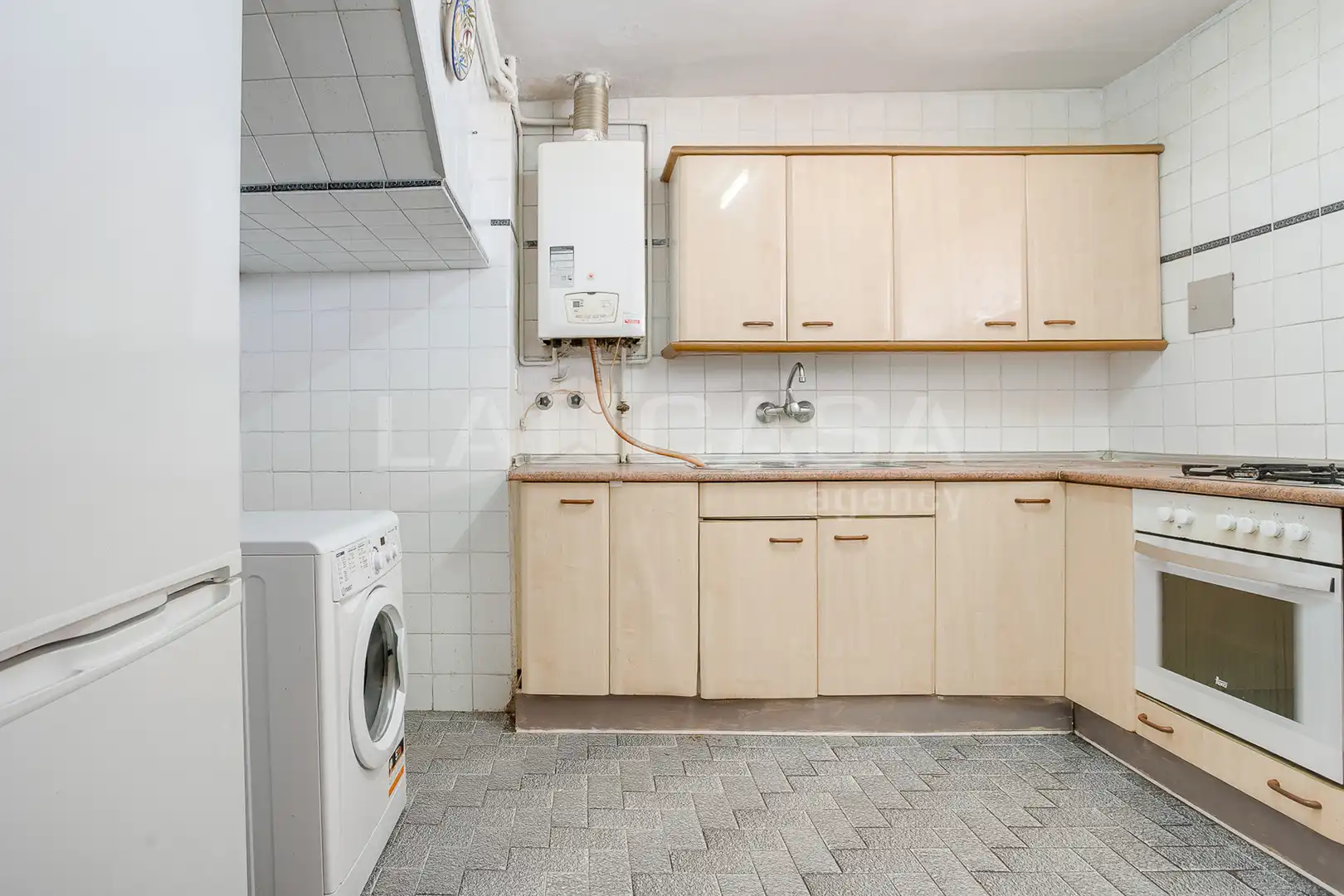 Cuina de Dúplex en venda en Barcelona amb Balcó