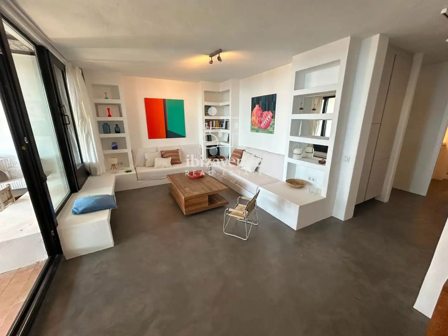Wohnzimmer von Einfamilien-Reihenhaus zur Miete in Santa Eulària des Riu mit Klimaanlage, Heizung und Terrasse