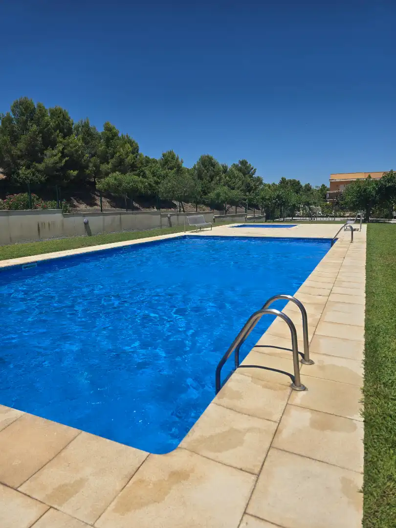 Schwimmbecken von Wohnung zum Verkauf in Vandellòs i l'Hospitalet de l'Infant mit Klimaanlage, Heizung und Privatgarten