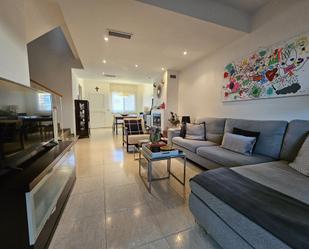 Living room of Single-family semi-detached for sale in Guardamar de la Safor  with Air Conditioner, Terrace and Community pool