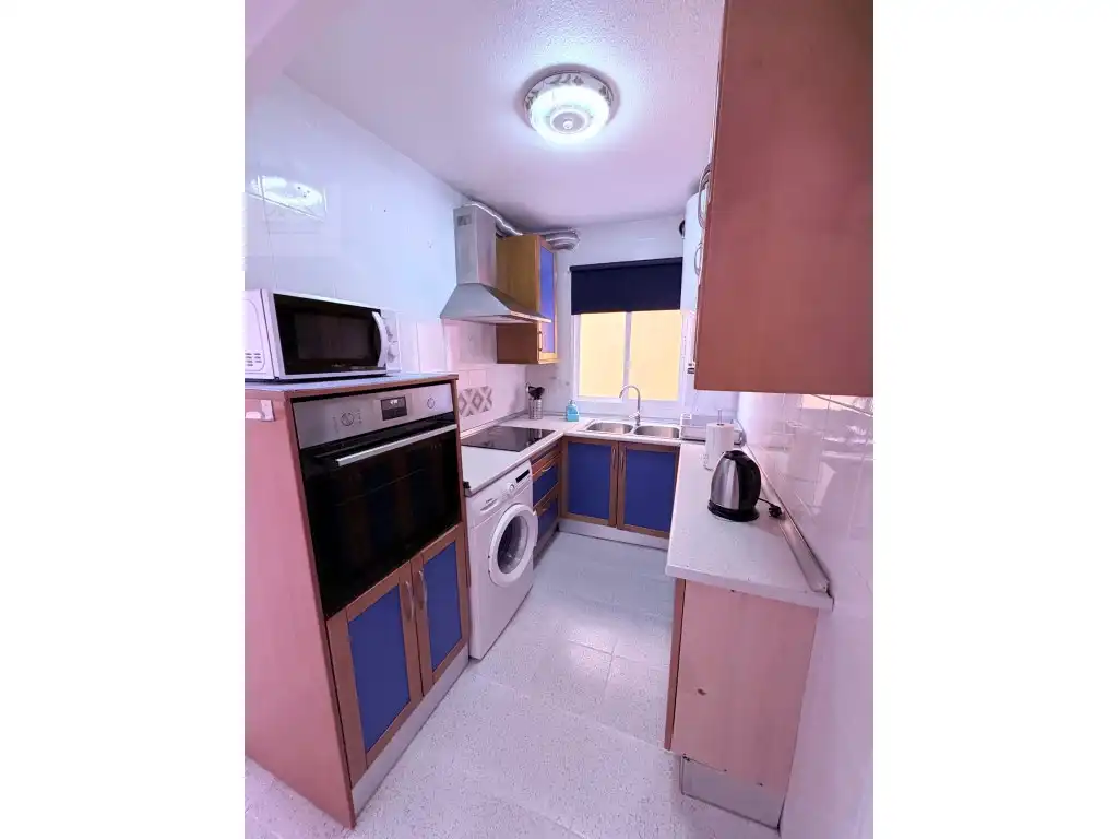 Cuina de Apartament en venda en Mazarrón amb Aire condicionat, Moblat i Piscina comunitària