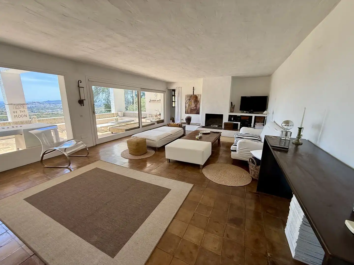 Sala d'estar de Finca rústica en venda en Santa Eulària des Riu amb Aire condicionat, Calefacció i Jardí privat