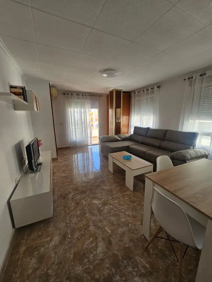 Sala d'estar de Apartament de lloguer en Torrevieja amb Aire condicionat, Calefacció i Terrassa