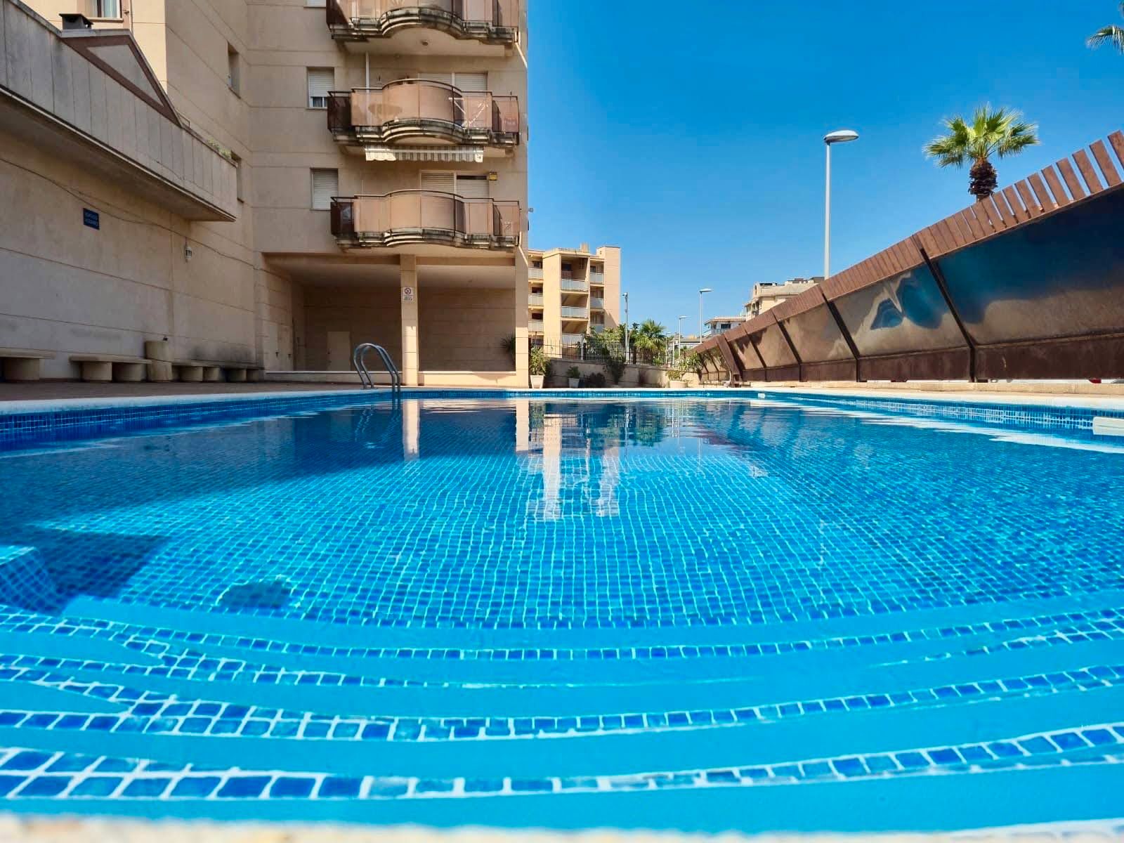 Swimming pool of Apartment for sale in Cunit  with Terrace, Balcony and Community pool