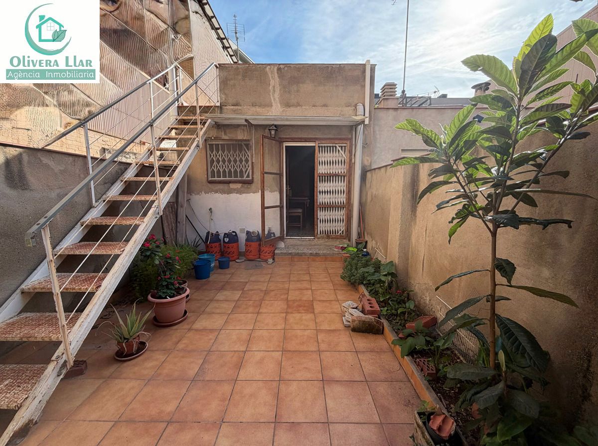 Casa adosada en venda a Centre