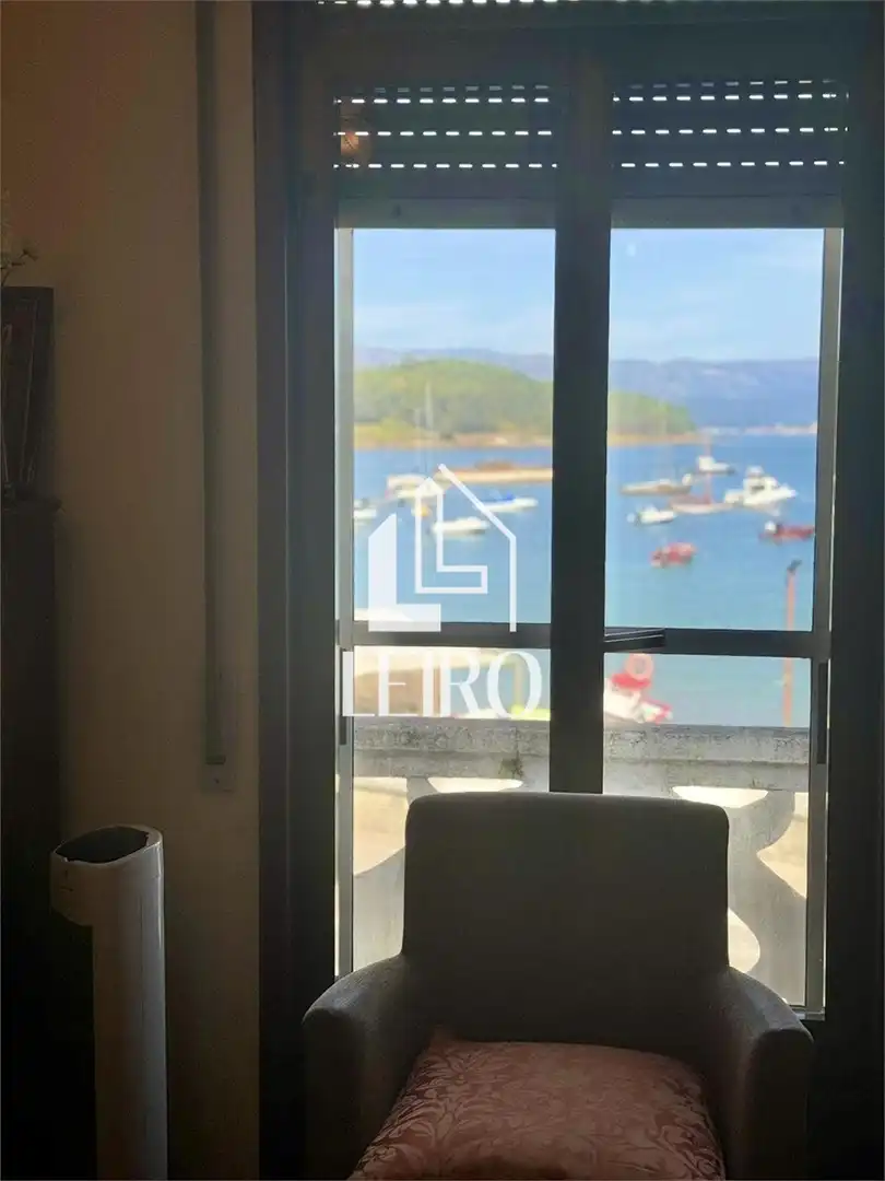 Casa adosada en venda en A Illa de Arousa  amb Calefacció, Terrassa i Moblat