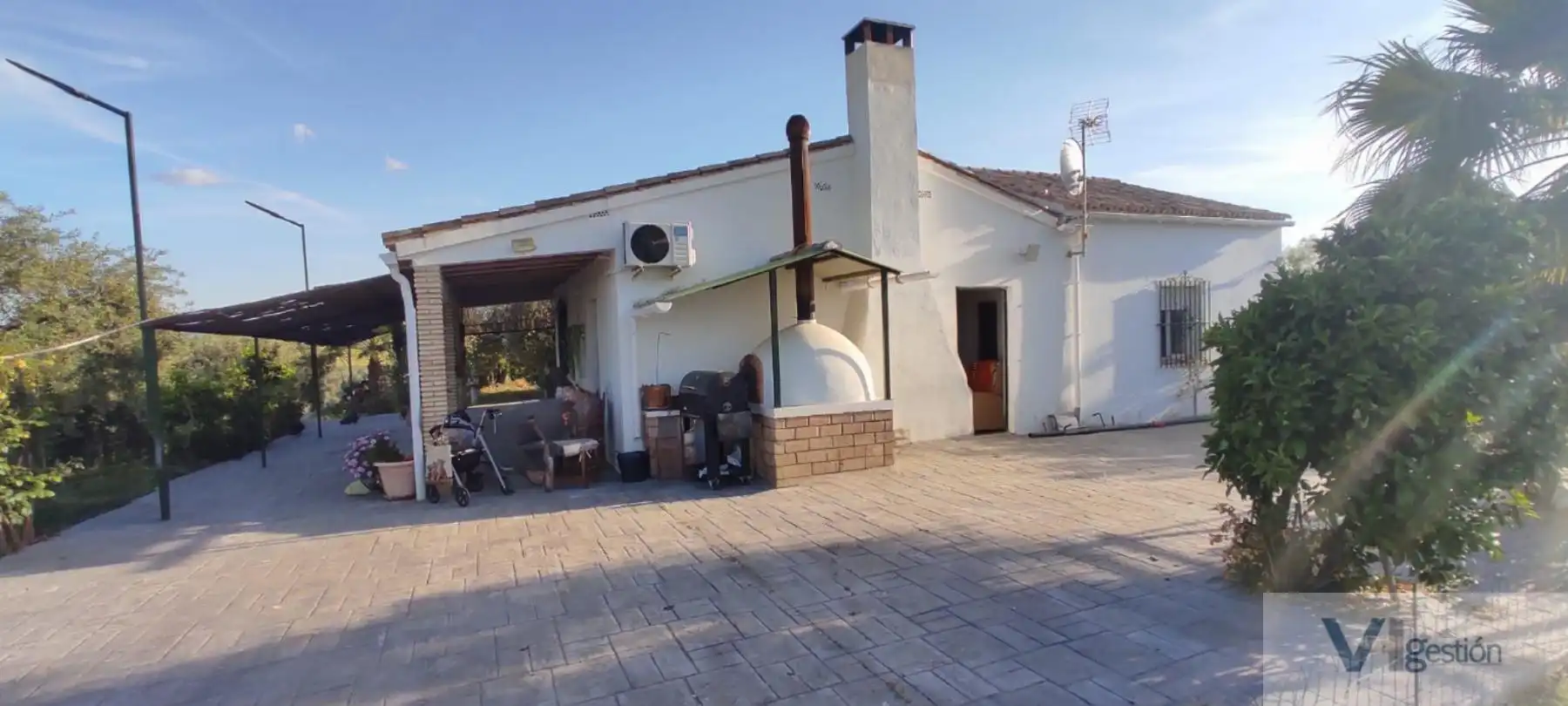 Casa rústica amb piscina en venda a El Coronil
