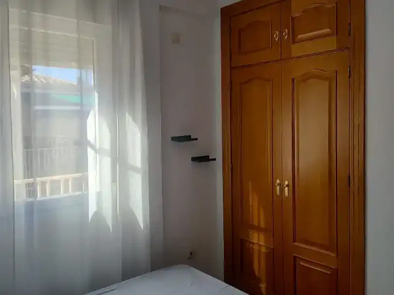 Habitación de Ático de alquiler en  Granada Capital con Aire acondicionado y Balcón
