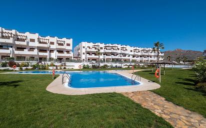 Swimming pool of Apartment for sale in Pulpí  with Air Conditioner, Heating and Private garden