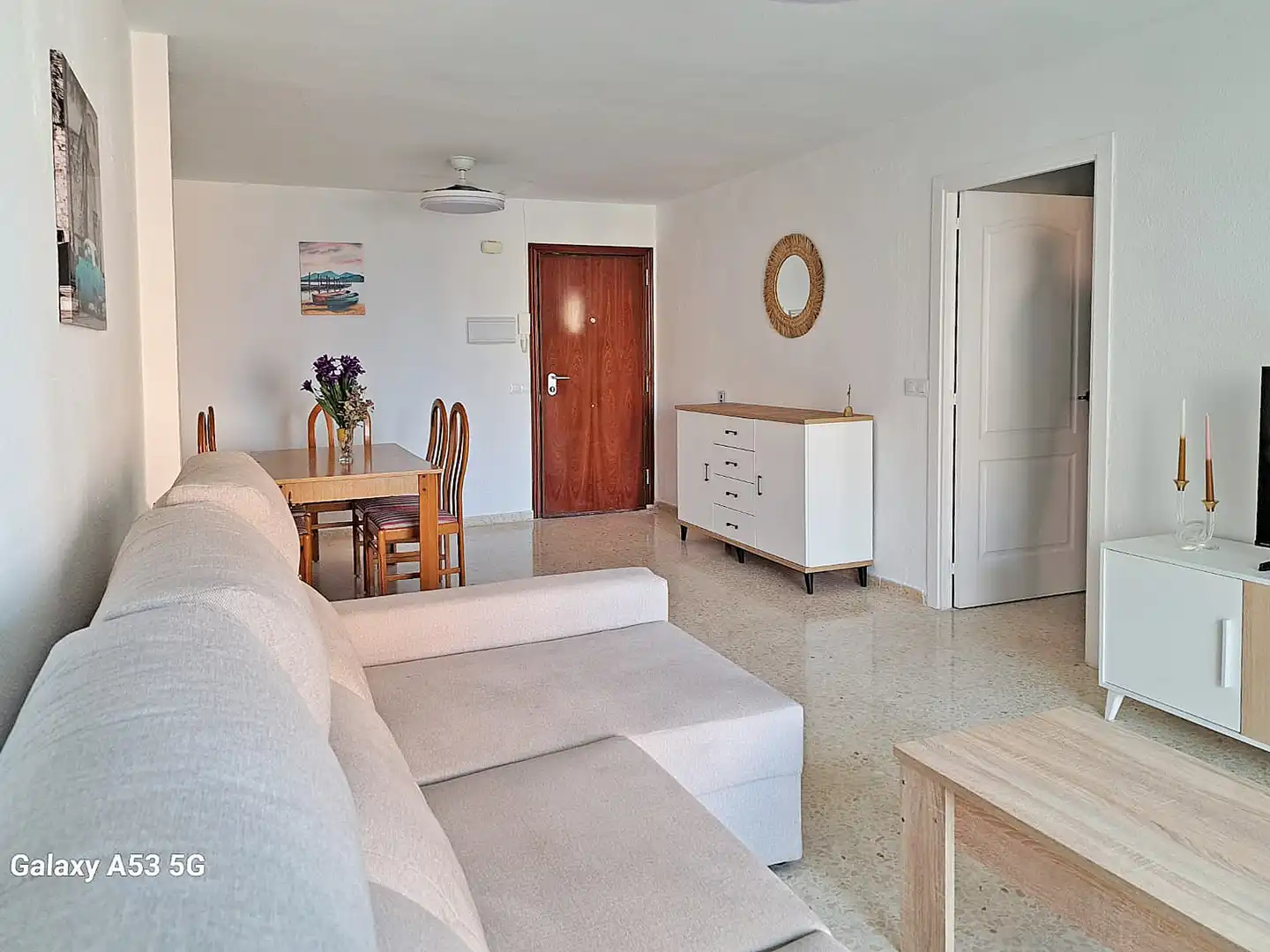 Sala d'estar de Pis de lloguer en Benalmádena amb Aire condicionat, Jardí privat i Terrassa