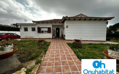 Vista exterior de Casa o xalet en venda en Aljaraque amb Aire condicionat, Jardí privat i Terrassa