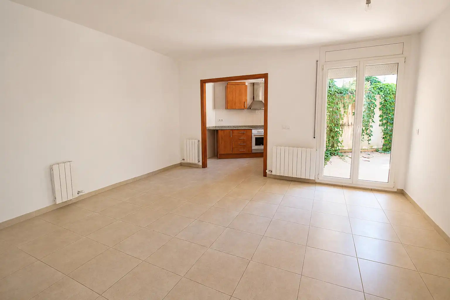 Sala de estar de Piso en venta en Sant Julià de Ramis con Calefacción, Terraza y Horno