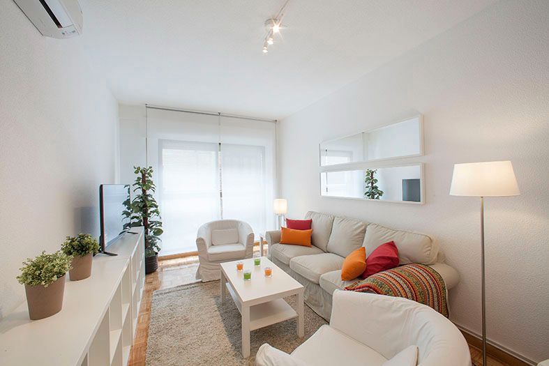 Living room of Flat to rent in  Madrid Capital  with Air Conditioner, Heating and Parquet flooring