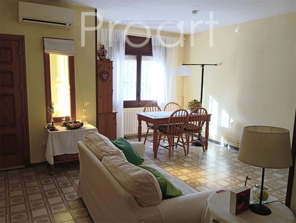 Sala d'estar de Casa adosada en venda en Riells i Viabrea amb Calefacció, Jardí privat i Terrassa