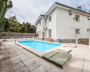 Swimming pool of Single-family semi-detached to rent in  Madrid Capital  with Air Conditioner, Terrace and Swimming Pool