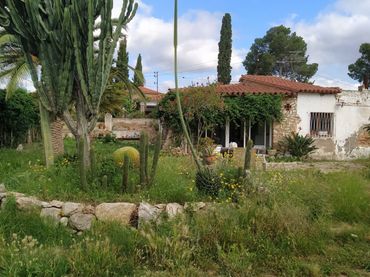 Casa amb jardí en venda a Miami Platja