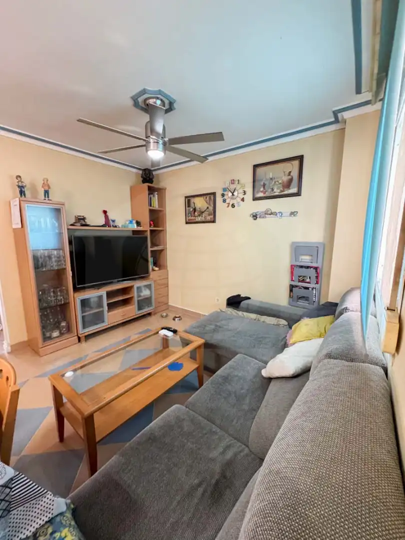 Sala d'estar de Casa adosada en venda en Cártama amb Terrassa i Piscina comunitària