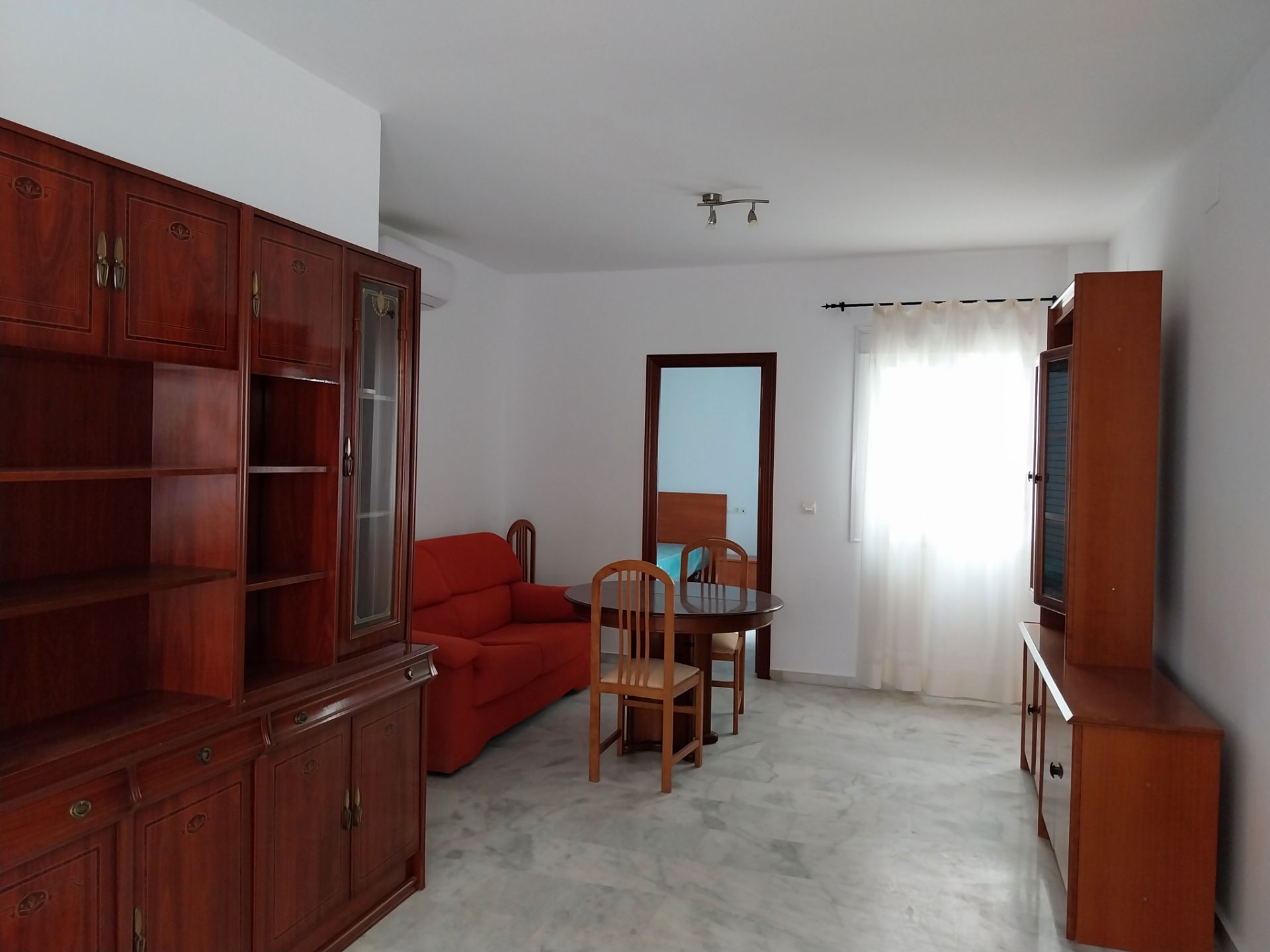 Sala d'estar de Pis en venda en Marchena amb Aire condicionat i Moblat