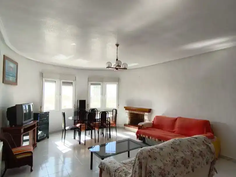 Sala d'estar de Casa o xalet en venda en Rojales amb Jardí privat, Piscina i Moblat