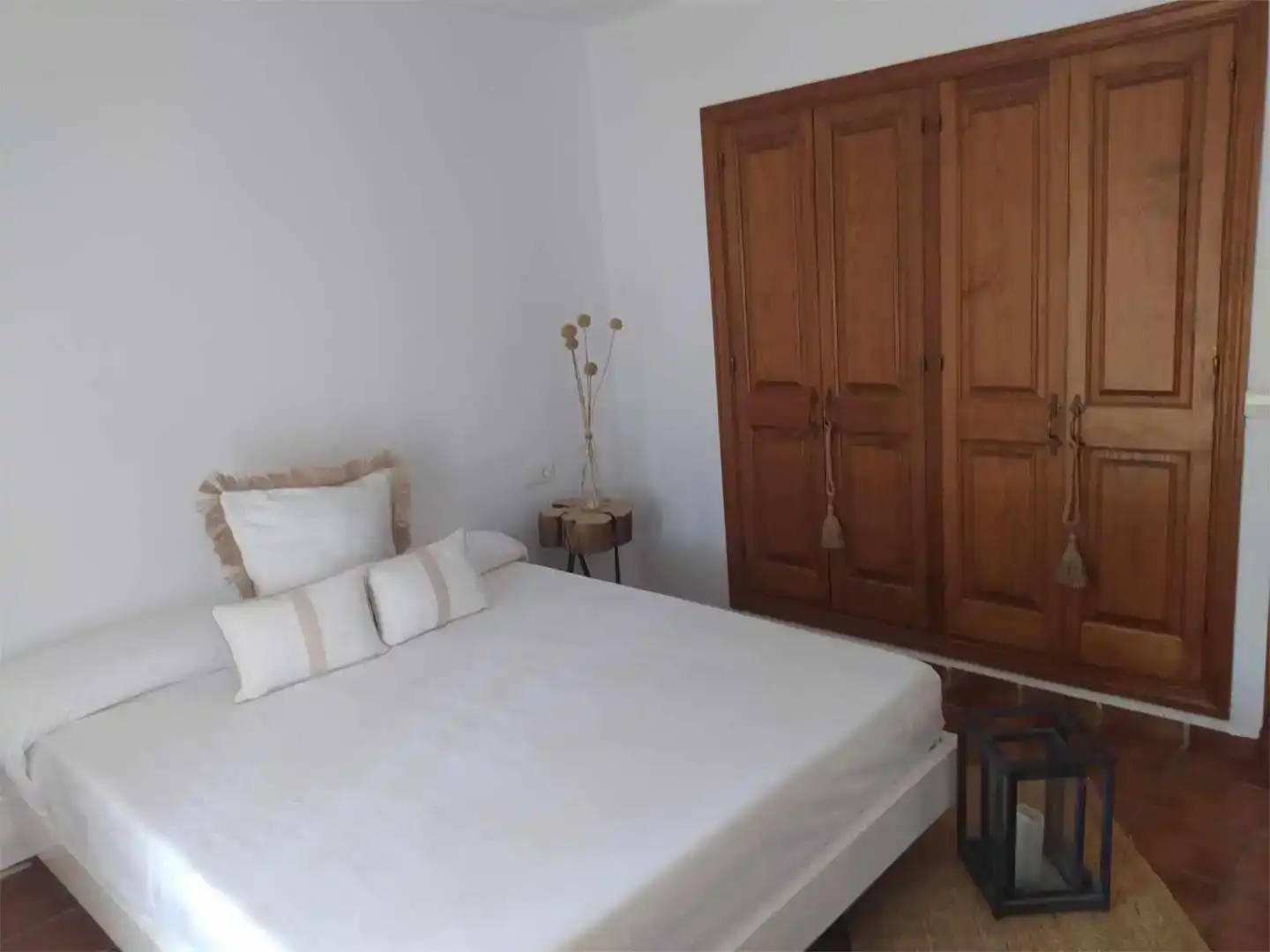 Dormitori de Casa adosada de lloguer en Ciutadella de Menorca amb Aire condicionat, Jardí privat i Piscina