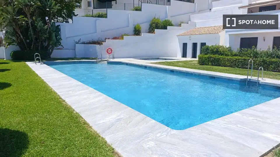 Swimming pool of Flat for share in Torremolinos  with Air Conditioner, Heating and Furnished