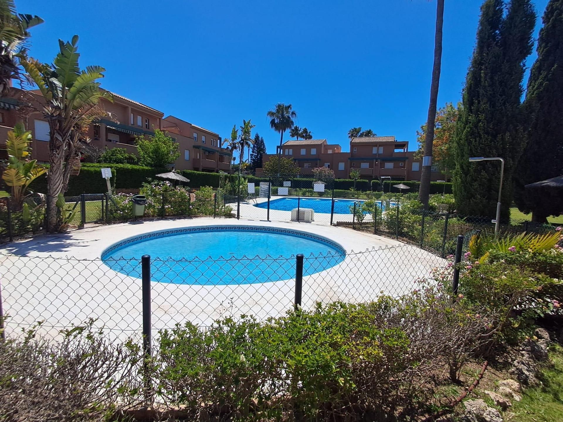 Swimming pool of Apartment for sale in Chiclana de la Frontera  with Air Conditioner, Heating and Private garden